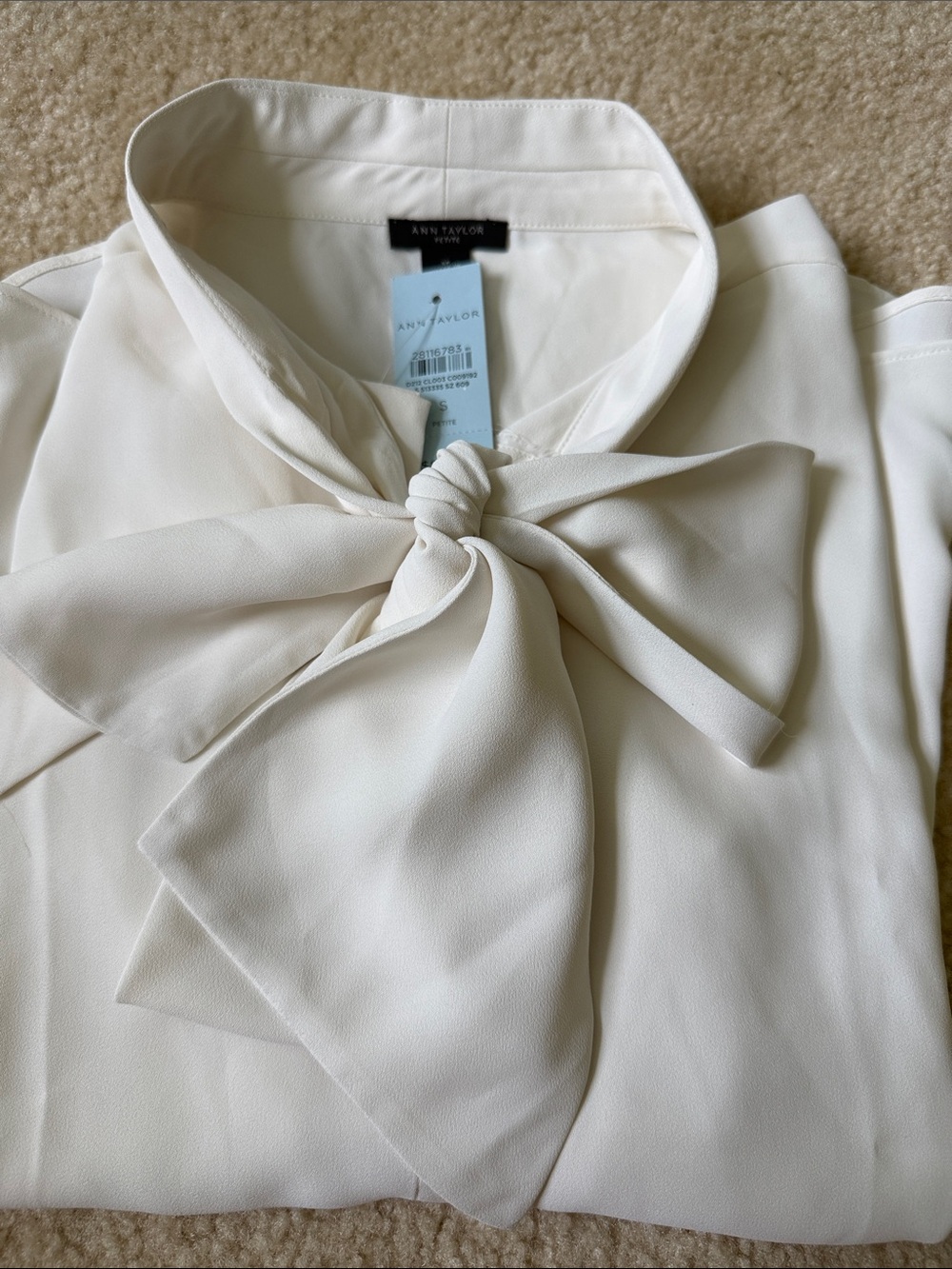 Brand new!!! Ann Taylor Ivory Tie-Neck Blouse size Petite S 100% polyester